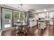 Dining area adjacent to the kitchen, with a large window and access to the patio at 1085 Queensgate Se Dr, Smyrna, GA 30082