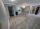 Bright dining room features hardwood floors and elegant chandelier at 6095 Blackberry Ln, Buford, GA 30518