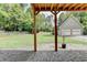 Brick patio and deck with access to a large fenced backyard at 1720 Mountainside Dr, Cumming, GA 30040