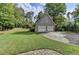 Two-car garage with large driveway and spacious backyard at 1720 Mountainside Dr, Cumming, GA 30040