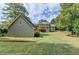 Two-story home with deck and large backyard at 1720 Mountainside Dr, Cumming, GA 30040