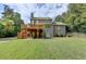 Two-story home with deck, patio, and spacious backyard at 1720 Mountainside Dr, Cumming, GA 30040