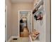 Bright laundry room with washer, dryer, and built-in storage at 1720 Mountainside Dr, Cumming, GA 30040