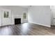 Gathering room with fireplace and hardwood floors at 108 Red Branch, Villa Rica, GA 30180