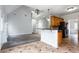 Open kitchen with granite countertops, stainless steel appliances, and wood cabinets at 108 Red Branch, Villa Rica, GA 30180