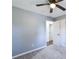 Spacious bedroom with ceiling fan and carpet flooring at 121 Mill Ln, Dallas, GA 30157