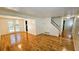 Bright dining room featuring hardwood floors and access to the backyard at 1043 S Millard Way, Stone Mountain, GA 30088