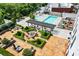 Overhead view of resort-style amenities, including a pool, fire pit, and patio at 2255 Peachtree Rd # 328, Atlanta, GA 30309