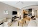Spacious living room featuring hardwood floors, a cozy sitting area, and an open floor plan at 2255 Peachtree Rd # 328, Atlanta, GA 30309