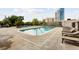 Inviting outdoor pool area with lounge chairs and hot tub at 2255 Peachtree Rd # 328, Atlanta, GA 30309