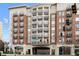 Modern building exterior with a grand entrance and Peachtree Rd address at 2255 Peachtree Rd # 328, Atlanta, GA 30309
