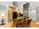 Open kitchen with breakfast bar, wood cabinets, and stainless steel appliances at 2255 Peachtree Rd # 328, Atlanta, GA 30309