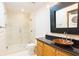 Modern bathroom with a large glass shower, updated vanity, and stylish fixtures at 2255 Peachtree Rd # 328, Atlanta, GA 30309