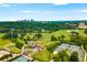 Aerial view of community with golf course and tennis courts at 2255 Peachtree Rd # 328, Atlanta, GA 30309