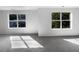 Bright bedroom with grey carpeting and large windows at 3217 Fairington Dr, Lithonia, GA 30038