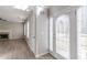 Living room with French doors and wood floors at 1983 Smithfield Ave, Ellenwood, GA 30294