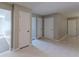 Clean and spacious hallway with tile floors and neutral walls at 1983 Smithfield Ave, Ellenwood, GA 30294