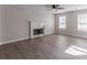 Living room with fireplace and hardwood floors at 1983 Smithfield Ave, Ellenwood, GA 30294