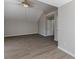 Spacious bedroom with wood-look floors and ceiling fan at 1983 Smithfield Ave, Ellenwood, GA 30294