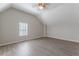 Large bedroom with vaulted ceiling, window, and ceiling fan at 1983 Smithfield Ave, Ellenwood, GA 30294
