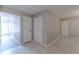 Bright hallway with neutral walls and doors to other rooms at 1983 Smithfield Ave, Ellenwood, GA 30294