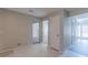 Hallway with tile floor and access to other rooms at 1983 Smithfield Ave, Ellenwood, GA 30294