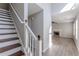 Wooden staircase with white railing at 1983 Smithfield Ave, Ellenwood, GA 30294