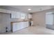 Modern kitchen with white cabinets and wood countertops at 1983 Smithfield Ave, Ellenwood, GA 30294