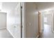 Bright hallway with doors to bedrooms and bathroom at 1983 Smithfield Ave, Ellenwood, GA 30294