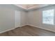 Spacious bedroom with new flooring and neutral walls at 1983 Smithfield Ave, Ellenwood, GA 30294