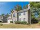 Two-story house with stone accents and two-car garage at 1983 Smithfield Ave, Ellenwood, GA 30294