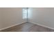 Bedroom with large window and new flooring at 1983 Smithfield Ave, Ellenwood, GA 30294