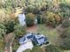 Aerial view of house and property near a pond at 220 Chambers Rd, Mcdonough, GA 30253