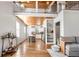 Open living room with high ceilings, loft, and hardwood floors at 1880 Vesta Ave, Atlanta, GA 30337