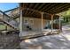Lower deck with stairs and access to backyard at 1880 Vesta Ave, Atlanta, GA 30337