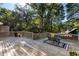 Large deck overlooking backyard with trees at 1880 Vesta Ave, Atlanta, GA 30337