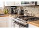 Kitchen details: granite countertop and stainless steel appliances at 1880 Vesta Ave, Atlanta, GA 30337