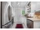 Bright kitchen with white cabinets and patterned floor at 885 Briarcliff Ne Rd # 16, Atlanta, GA 30306