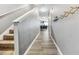 Light and bright entryway with stairs and wood-look floors at 2996 Jonesboro Se Rd # E, Atlanta, GA 30354