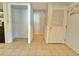 Laundry area with tile flooring and built in shelving at 3801 Orchard Se Rd, Smyrna, GA 30080