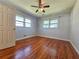 Spacious bedroom with hardwood floors and ceiling fan at 3801 Orchard Se Rd, Smyrna, GA 30080