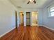 Bedroom with hardwood floors and access to bathroom and hallway at 3801 Orchard Se Rd, Smyrna, GA 30080