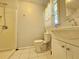 Clean bathroom featuring a shower, toilet and vanity at 3801 Orchard Se Rd, Smyrna, GA 30080