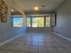 Bright living room with tiled floors and large bay window at 3801 Orchard Se Rd, Smyrna, GA 30080