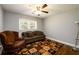 Spacious bedroom with hardwood floors and ceiling fan at 2620 Old Covington Ne Rd, Conyers, GA 30013