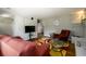 Living room with hardwood floors and a cozy fireplace at 2620 Old Covington Ne Rd, Conyers, GA 30013