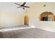 Living room with vaulted ceiling, fireplace and kitchen view at 3869 Merryweather Trl, Austell, GA 30106