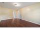 Bright bedroom with wood-look flooring and access to hallway bathroom at 3869 Merryweather Trl, Austell, GA 30106