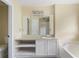 Bathroom with a bathtub, shower, and updated vanity at 3869 Merryweather Trl, Austell, GA 30106