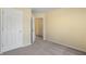 Simple bedroom with neutral walls and carpet flooring at 3869 Merryweather Trl, Austell, GA 30106